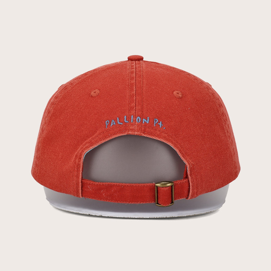 Pallion Point red sardine dad cap with Pallion Pt. embroidered in blue-grey on the back. 